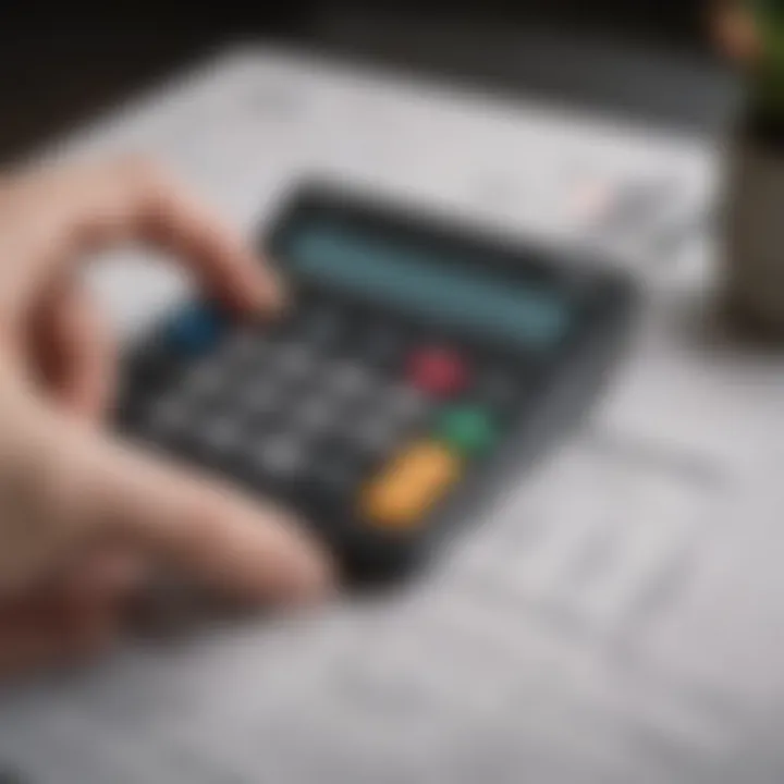 A person analyzing bank statements with a calculator and a debit card